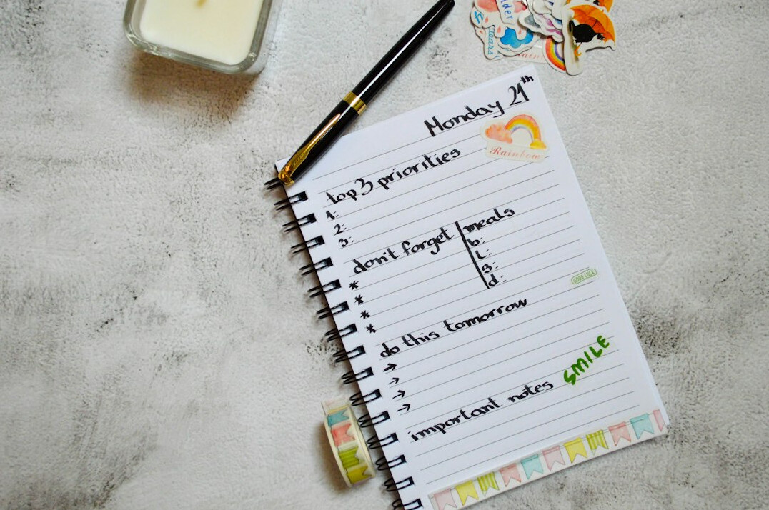 person planning weekly goals