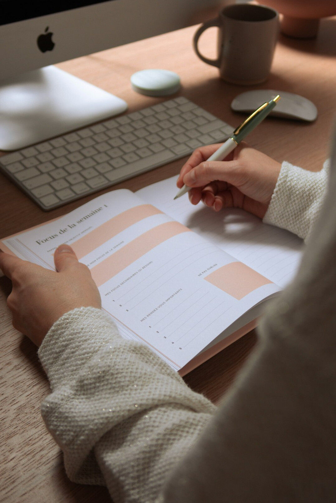 person planning day with notebook