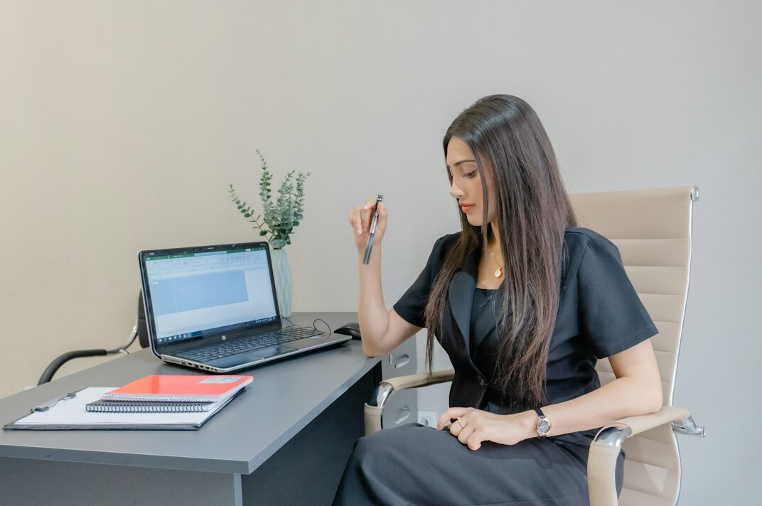woman meditating at desk