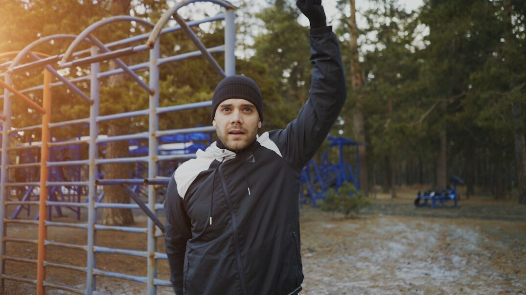 man achieving goals outdoors